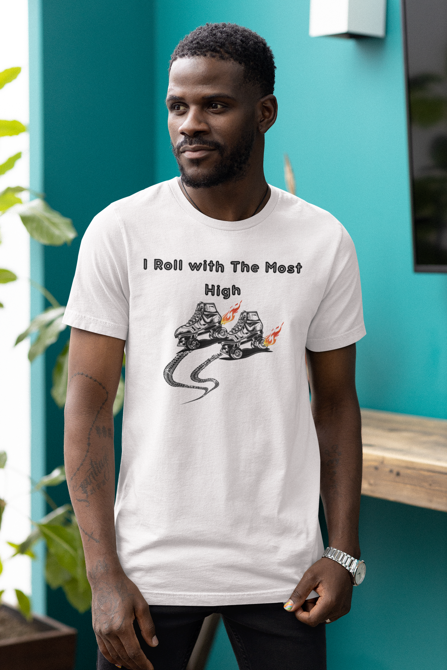 man standing in room near window with white tee that reads "I Roll with the Most High Christian tshirt, skate lovers gift, Religious graphic tee, Roller skating gift, motivational exercise shirt, Jesus tshirt **see matching mug,