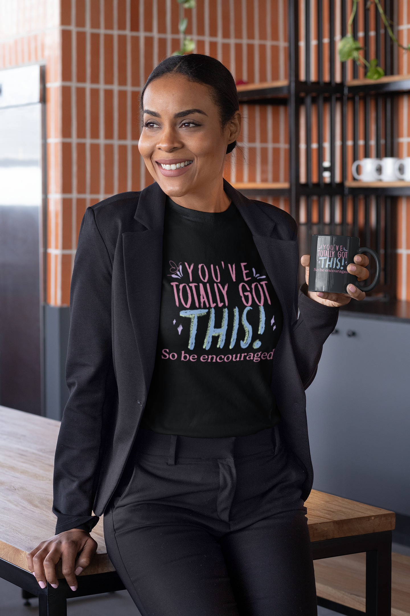 smiling woman sitting with coffee mug wearing tee that reads-You've Totally Got This, So be encouraged! Christian motivational t-shirt, Inspirational gift tee, teacher gift , nurses week gift, Bible tee, encouragement tshirt, graduation gift tee, birthday shirt