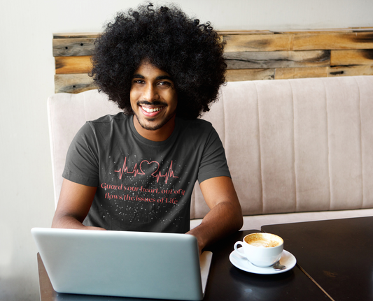 man sitting behind laptop with black shirt  reading-Guard your heart, out of it flows the issues of Life -Christian t-shirt, gift for mom, inspirational tshirt, tee available in white also.