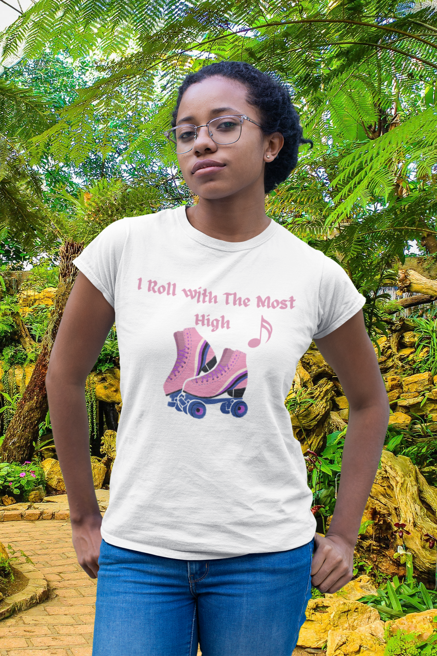 woman standing in park near tree with white tee with pink skates which reads-I Roll with the Most High God tee, Christian women's tshirt, Jesus t-shirt, Motivational graphic tshirt , skate gift, religious skate party tee, faith gift, gift for mom or wife, sister daughter gift. ** see matching mug, available in many colors